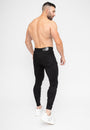 Men's Black Ripped Skinny Fit Stretch Jeans Denim Pants Rear Pose